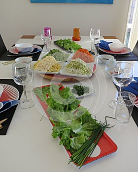 Laid table with korean food photo