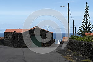 Lajido village Pico Island Azores black lava houses red windows