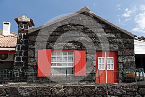 Lajido village Pico Island Azores black lava houses red windows