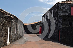 Lajido village Pico Island Azores black lava houses red windows