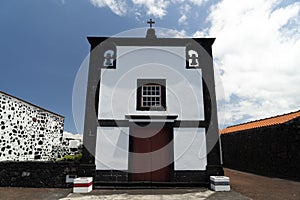 Lajido village Pico Island Azores black lava houses red windows