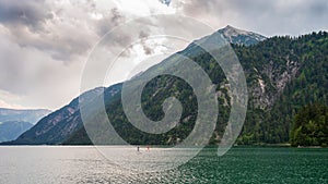 Lake achen surrounded by mountains in Tirol Austria