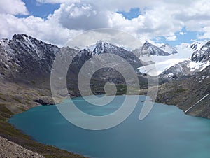 Lake Alla Kol in mountains in Kyrgyzstan