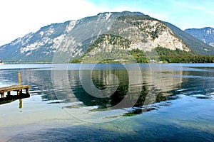 Lake among alpine mountains in the city of Hallstadt in Austria