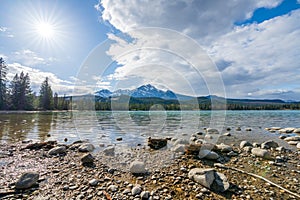 Lake Annette lake shore beach. Jasper National Park, Canadian Rockies, Alberta, Canada.