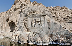 Lake around the ancient relief in Kermanshah - Taq-e Bostan in Iran. photo