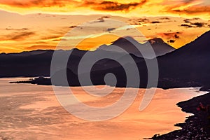 Lake Atitlan & 3 volcanoes at sunrise, Guatemala