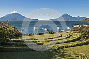 Lake Atitlan with volcanoes in background