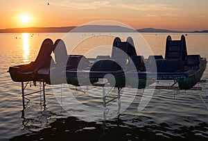 Lake Balaton sunset with pedal boats in the front