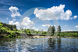 Lake and beautiful cloudy sky