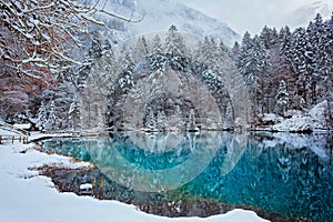 Lake Blausee in swiss Alps, Switzerland