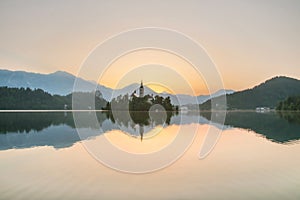 Lake Bled at dawn with island and castle, Slovenia