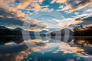 Lake Bled island with church in beautiful morning sunrise golden hour