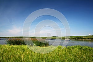 Lake with blue sky