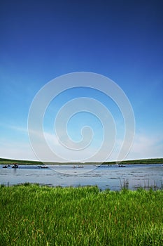 Lake with blue sky