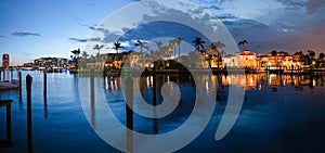 Lake Boca Raton and city skyline with reflections at sunset, panoramic view photo