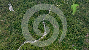 LAKE BOHINJSKO, SLOVENIA - APRIL, 2023: Aerial drone footage. Mauntain landscape near lake from the air on sunny day