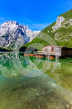 Lake Braies also known as Pragser Wildsee  in beautiful mountain landscape. Relaxing and recreation at Lago di Braies in Dolomites