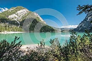 Lake Braies also known as Pragser Wildsee or Lago di Braies in Dolomites Mountains, famous for hiking