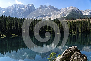 Lake Caress Dolomites Italy. Lake of Caresse in Italy. Scenic place and famous touristic destination. Primeval nature