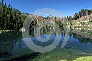 Lake Caress Dolomites Italy. Lake of Caresse in Italy. Scenic place and famous touristic destination. Primeval nature