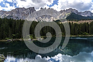 Lake Caress Dolomites Italy. Lake of Caresse in Italy. Scenic place and famous touristic destination. Primeval nature