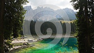 Lake of Carezza in the Dolomite Alps in Italy photo