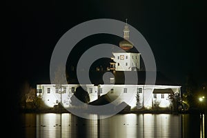 Lake castle Ort (Seeschloss Ort) at night. photo