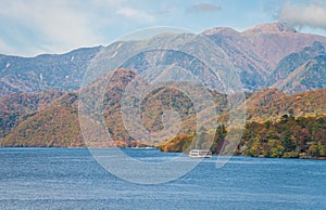 Lake Chuzenji and montain range in autumn.