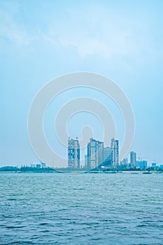 Lake and city under blue sky