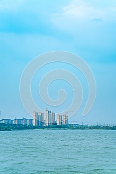 Lake and city under blue sky