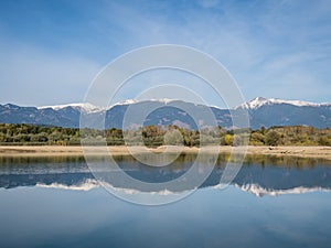 The lake with clear turquoise water is surrounded by mountains. Liptovska Mara Slovakia. The concept of ecological and active tour