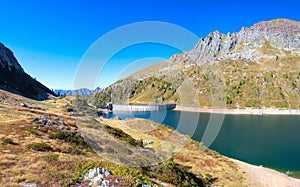 The lake Colombo dam with the Becco lace in the Brembana valley orobie Alps photo