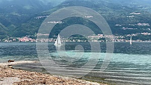 Lake Como, Bellano, Italy: Sailboats sailing on a sunny summer day