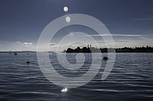 Lake Constance in late summer. The water glistens in the evening sun