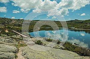 Lake from dam in a rocky terrain on highlands