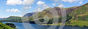 Lake District panorama Buttermere The Lakes National Park Cumbria England uk on a beautiful sunny summer day surrounded by fells