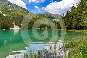 Lake Dobbiaco (Toblacher See, Lago di Dobbiaco) in Dolomite Alps, South Tirol, Italy - Travel destination in Europe