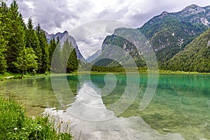 Lake Dobbiaco (Toblacher See, Lago di Dobbiaco) in Dolomite Alps, South Tirol, Italy - Travel destination in Europe