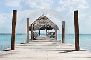 Lake dock with hammocks, El Remate, Guatemala