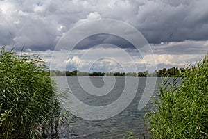 lake with dramatic sky in summer