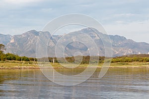 Lake El Salto Mexico with mesquite tree stumps