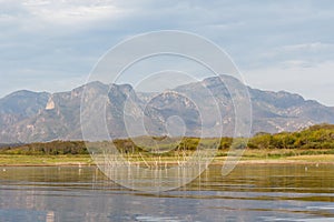 Lake El Salto Mexico with mesquite tree stumps