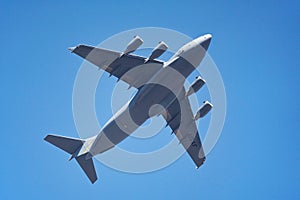 Lake Elsinore, CA, USA - November 30, 2022: A United States Air Force C-17 Globemaster III flies overhead.