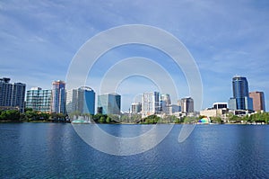 Lake Eola, High-rise buildings, skyline, and fountain Downtown Orlando, Florida, United States, April 27, 2017.