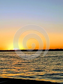 Lake erie sunset over lake with horizon.