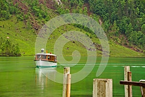 Lake excursion boat approaching dock