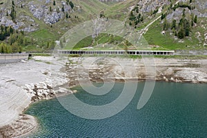 The dam of Lago di Fedaia, at the foot of the Marmolada mountain. Trento, Itlay. photo