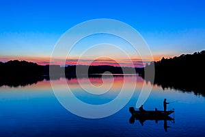 Lake fishing at Sunset photo