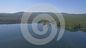 Lake, forest and boats in Harbour, Summer Colours. Sea and forest, landscape view on harbour aerial view
